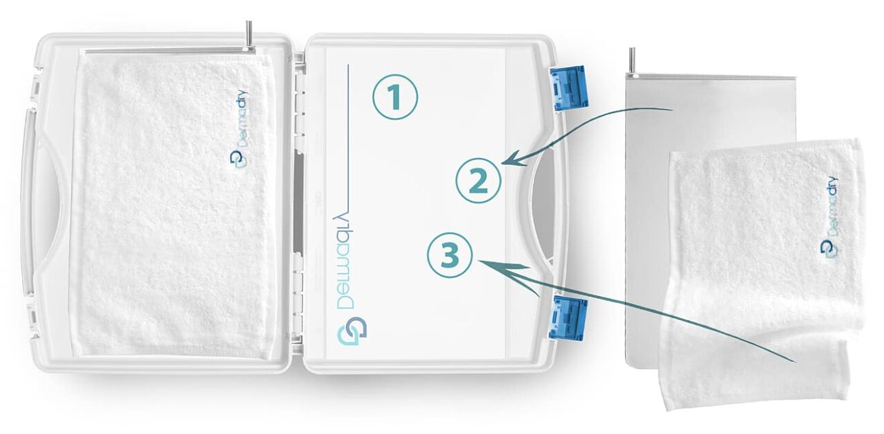 Koffer von Dermadry mit Handtüchern und Elektroden
